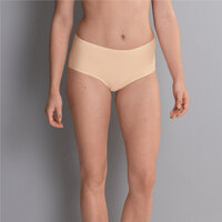Huidkleurige slip of string onder een witte broek of rok Huidkleurige slip of string onder een witte broek of rok